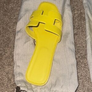 Hermes Yellow Sandals with H-Cutout Design